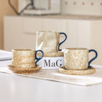Wabi-sabi style ceramic coffee cup and saucer set