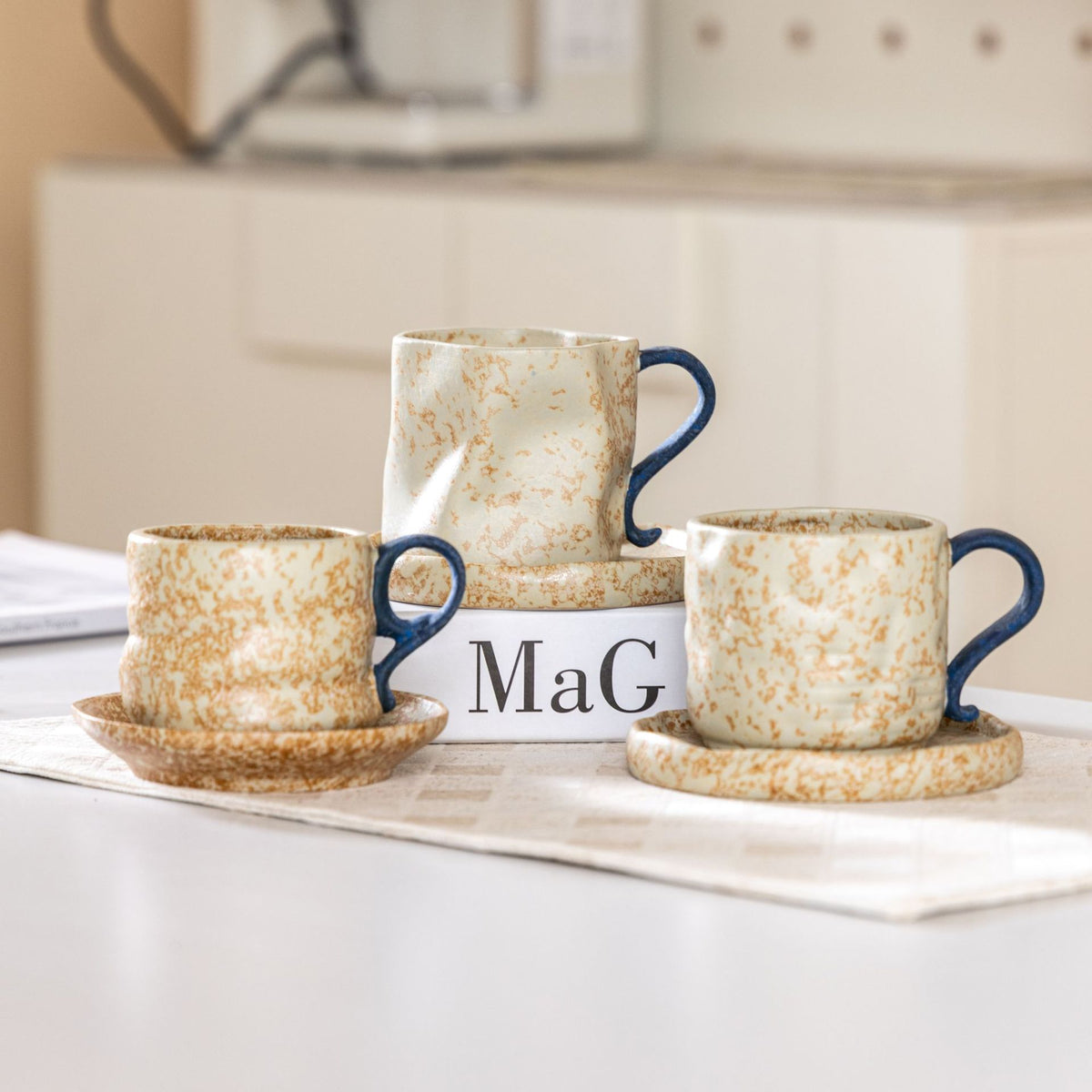 Wabi-sabi style ceramic coffee cup and saucer set